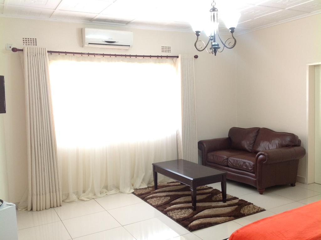 Cypress Executive Lodge Ливингстон Номер фото